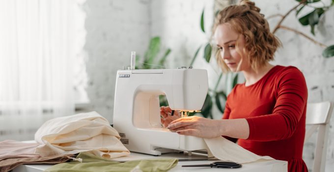 woman sewing fabrics