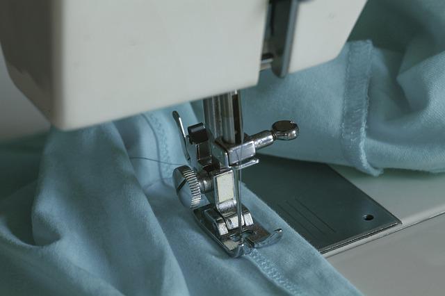sewing the light blue colored fabric