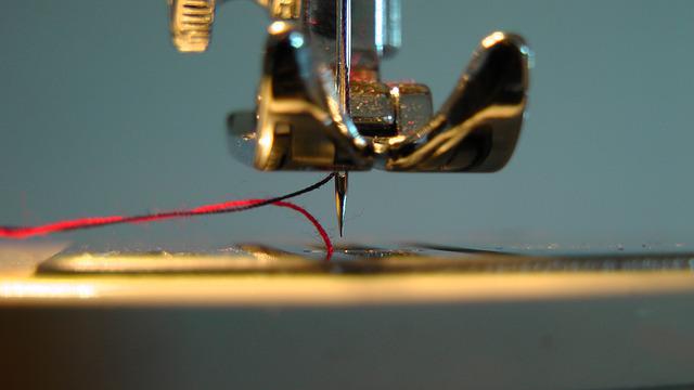 close view of sewing machine needle