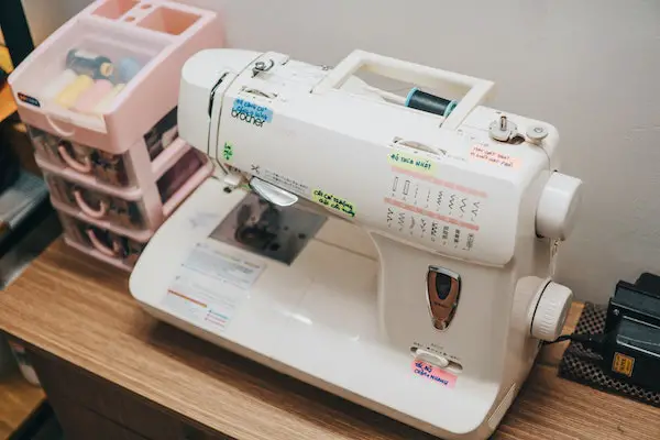white coloured embroidery machine