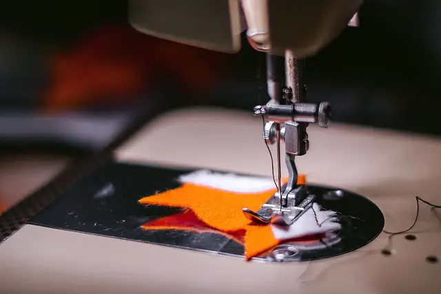 close view of sewing machine stitching 